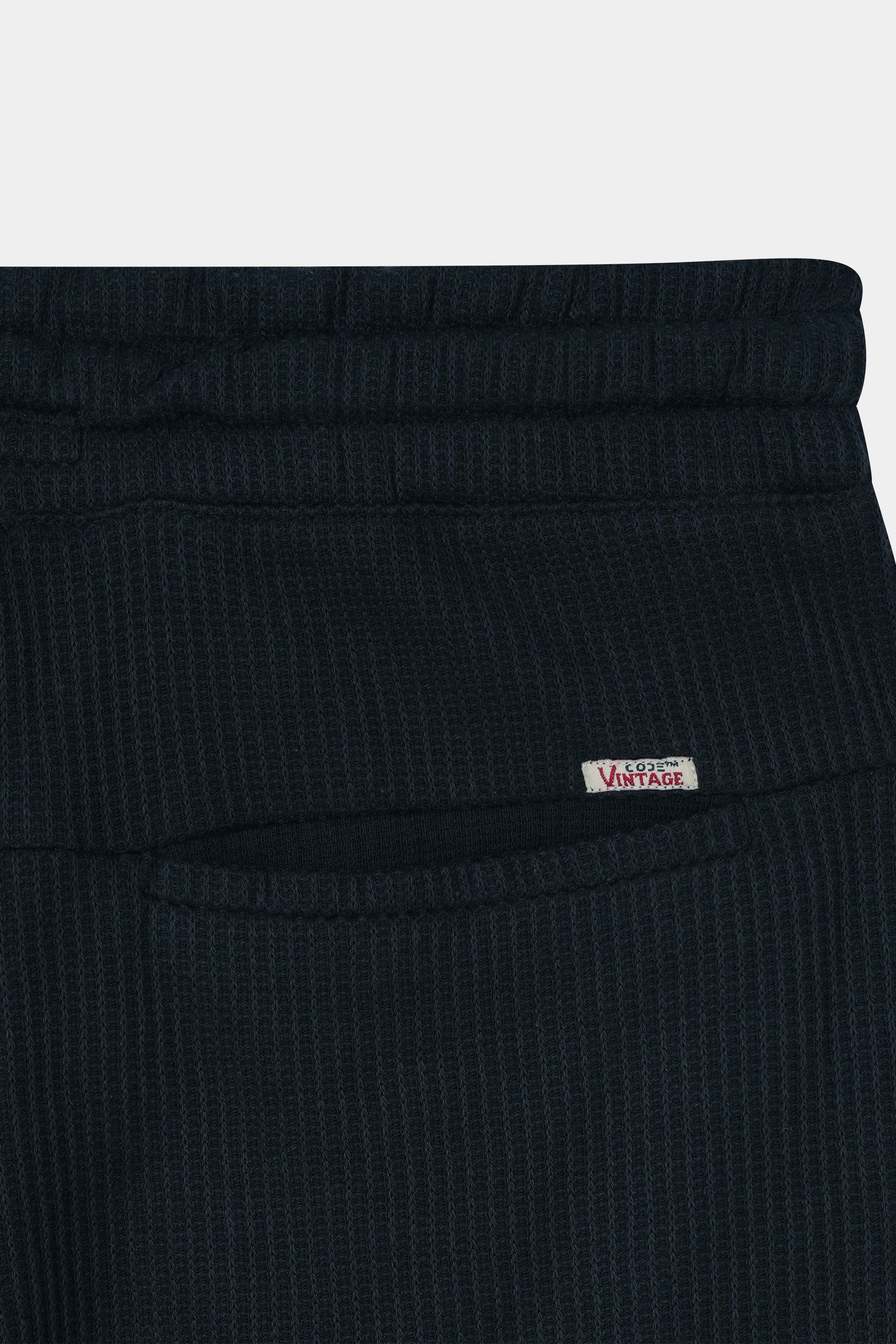 BLACK WAFFLE KNIT CROSS POCKET SHORT